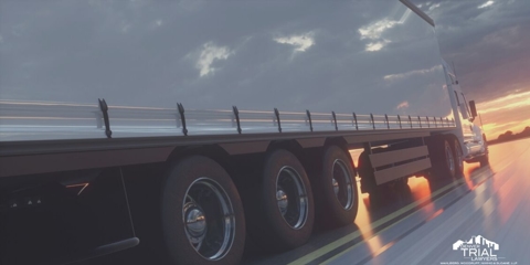 Large tractor trailer on the road.